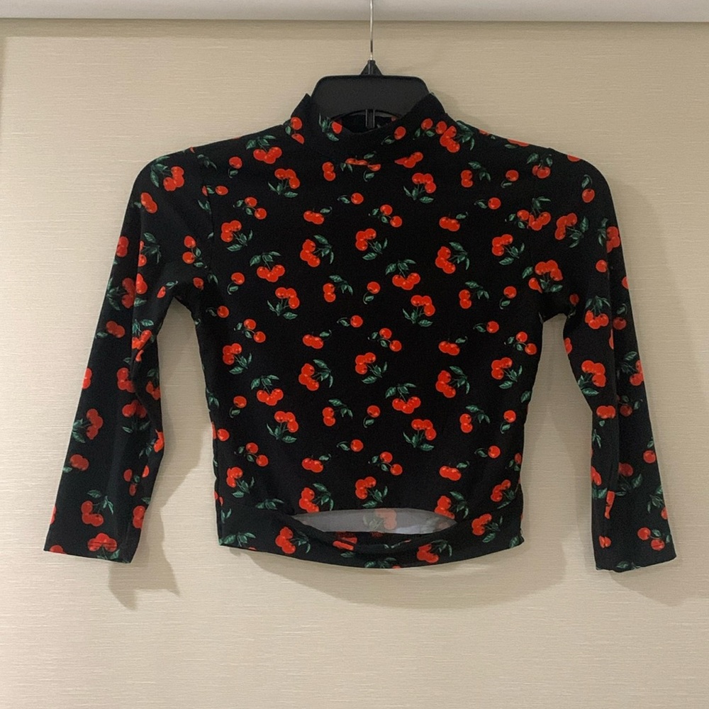 Long Sleeve black cropped turtle neck with cherries. Size M